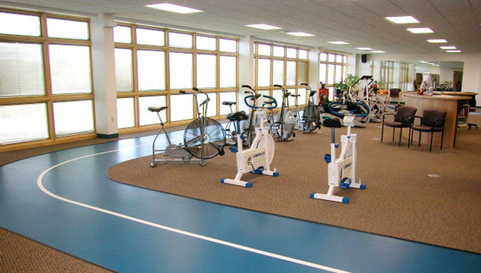 A wall of windows brings daylight into the interior of the 12,800 square foot cardiac rehabilitation facility at Fitzgibbon Hospital.